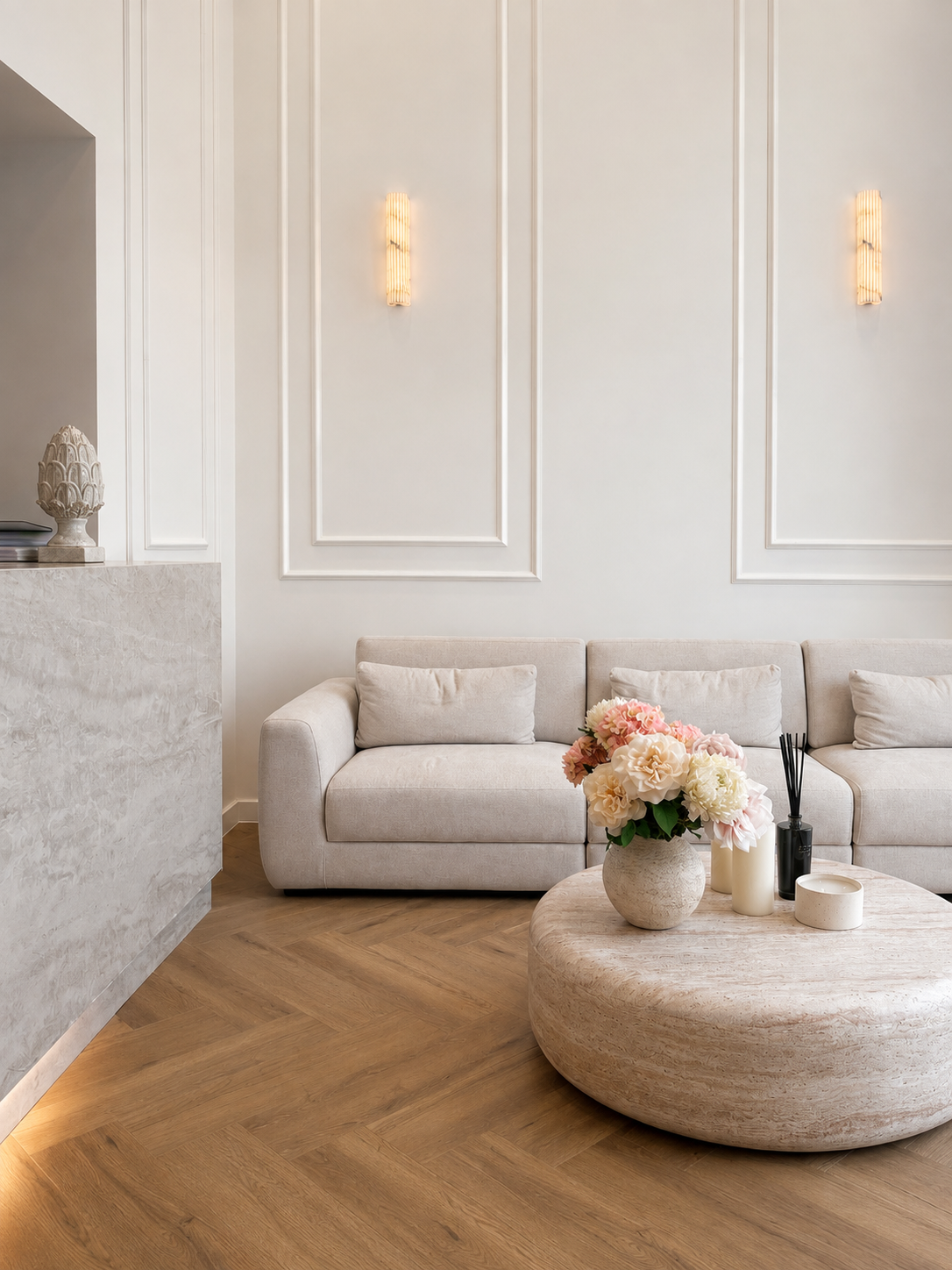 Serene minimalist treatment room at Skin Medical Clinic with travertine stone and soft daylight